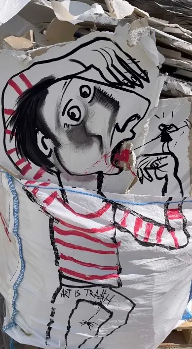 Large striped-shirt figure on the street – urban art Barcelona Large drawing of a figure in a striped shirt on the street, Barcelona, Art Is Trash